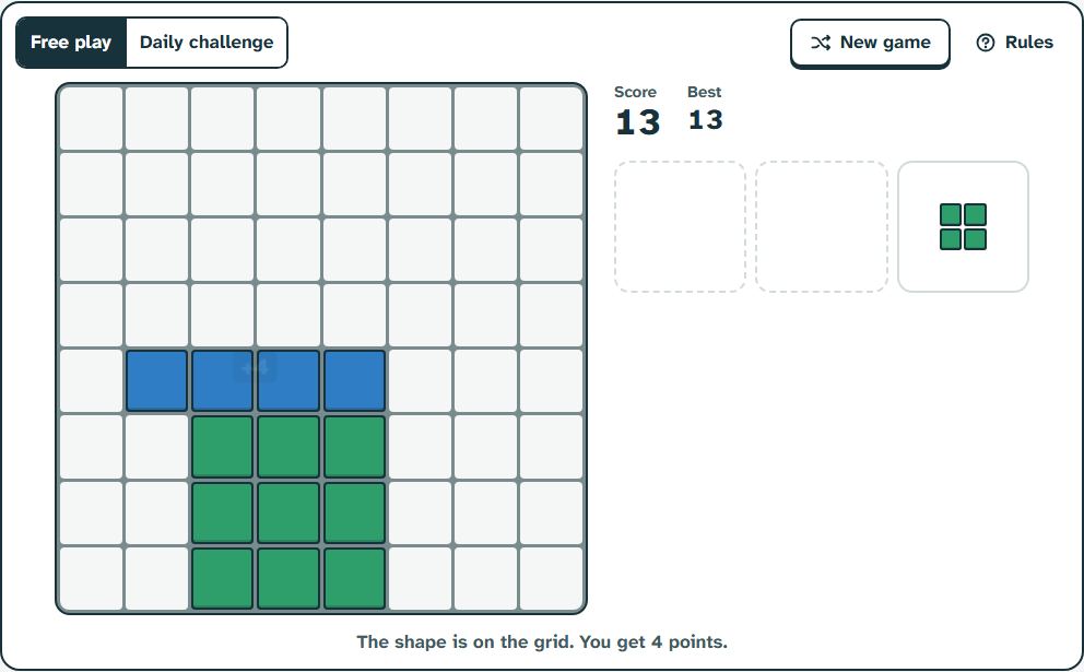 Block Fit after two shapes have been placed, with the score and the shape offer next to the grid.